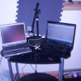 Temporary Office So in the move from old to new, all my computer stuff has been packed away. I am working on the new office and in the meantime, I had to set up a temporary workstation. It will be a good alternate work area for getting more work done. Pictured is my 2 laptops – the Dell D600 and the Lenovo. Mixer is the 2...